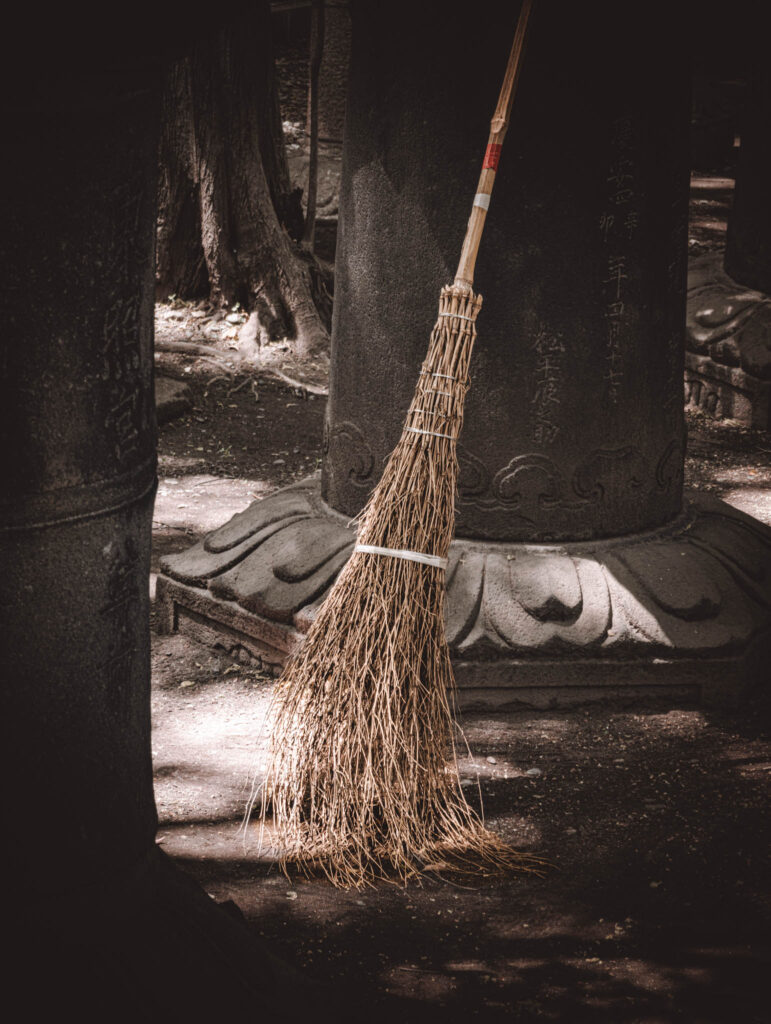 Ueno Toshogu, Tokyo (April 21, 2025) broom among kasuga-dōrō lanterns