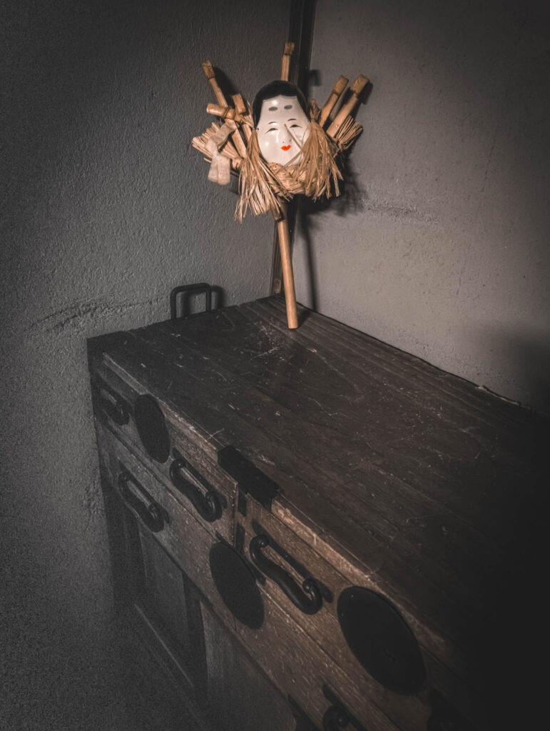 Fukagawa Edo Museum, Koto City, Tokyo (April 23, 2025) kumade rake with otafuku mask on a tansu