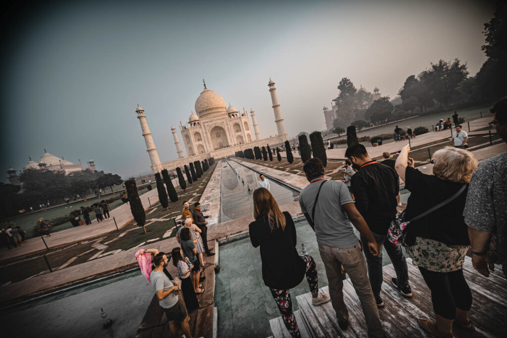 Taj Mahal (photo October 26, 2019): mausoleum south face & tourists from Hawd al-Kawthar ("Tank of Abundance")