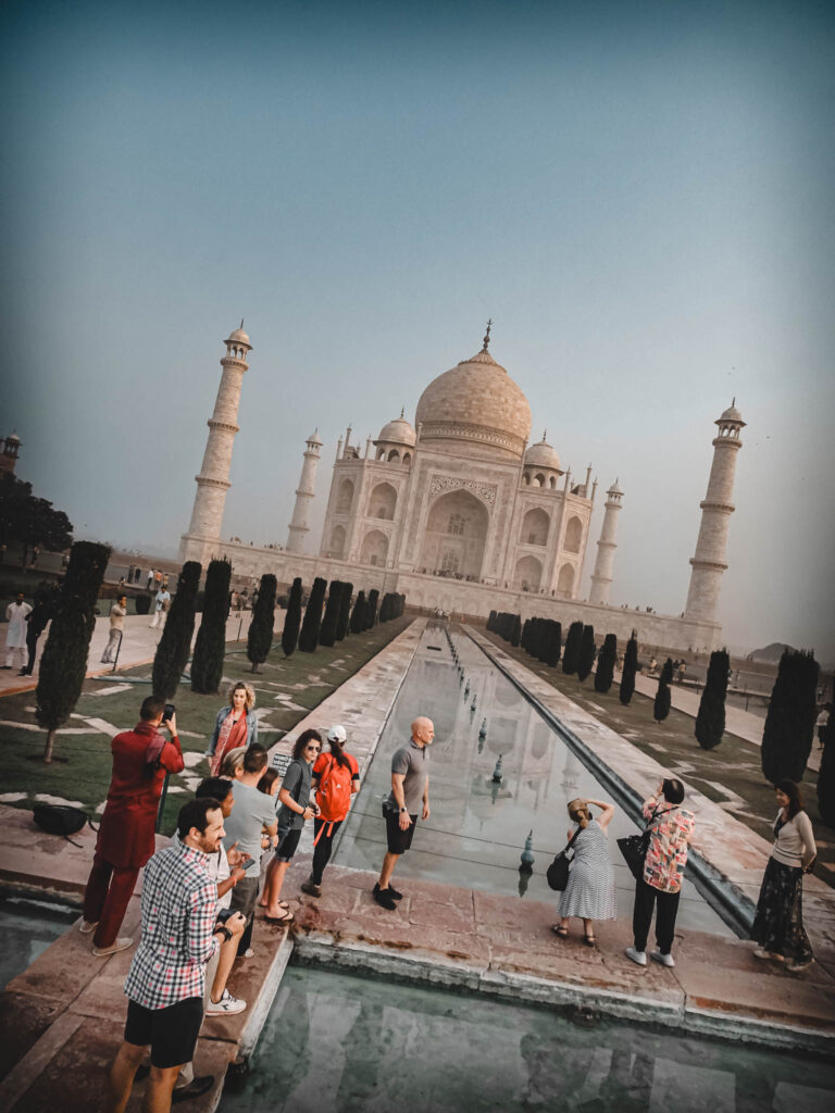 Taj Mahal (photo October 26, 2019): mausoleum south face & tourists from Hawd al-Kawthar ("Tank of Abundance")
