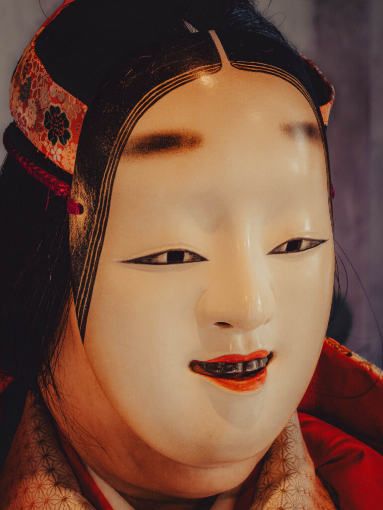 Sado Daizen Shrine Noh Stage, Takeda, Sado Island, rebuilt 1846 (Nov. 6, 2025): KY wearing antique 万媚 (Manbi, demon disguised as a young woman) nō-men and Karaori robe.