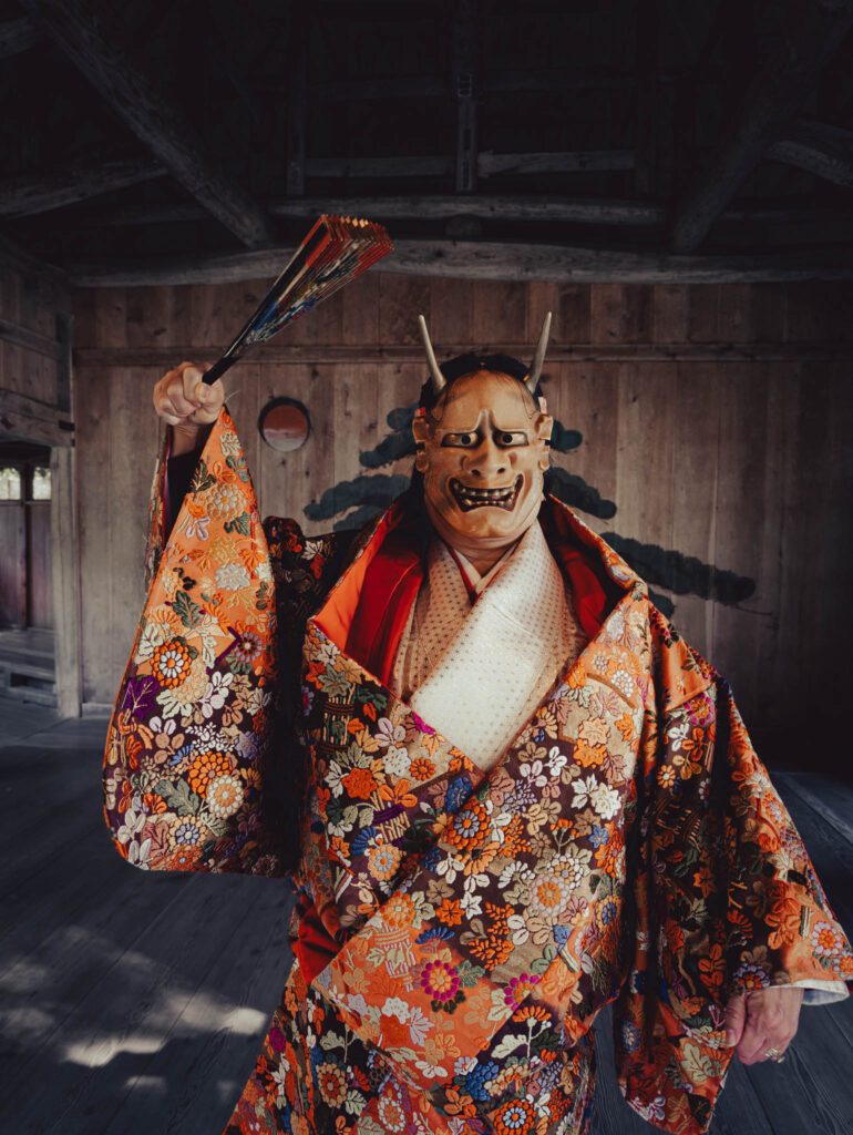 Sado Daizen Shrine Noh Stage, Takeda, Sado Island, rebuilt 1846 (Nov. 6, 2025): KY wearing antique 般若 (Hannya, jealous female demon) nō-men and Karaori robe, with ōgi fan.