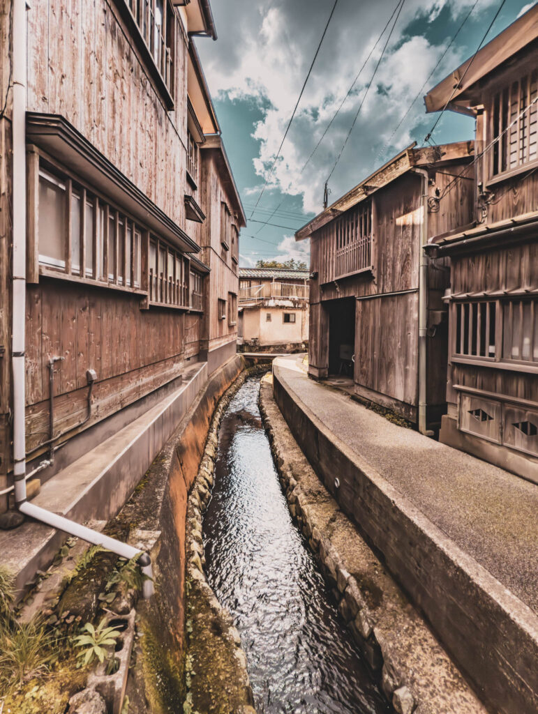 Shukunegi, Sado Island (photo November 6, 2025): Shokojigawa River and townhouses..