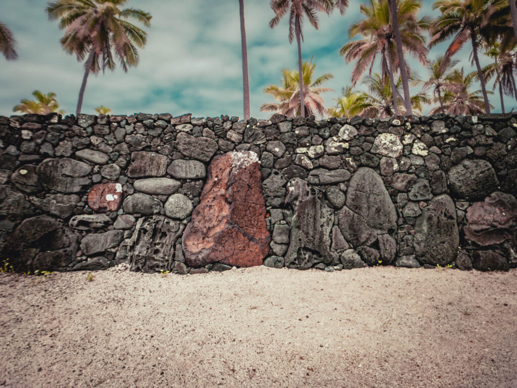 Puʻuhonua o Hōnaunau National Historical Park, Hōnaunau, Hawai'i (photo August 21, 2021): Pā Puʻuhonua (Great Wall of the Place of Refuge), originally b. 15th C. Puʻuhonua o Hōnaunau National Historical Park, Hōnaunau, Hawai'i (photo August 21, 2021): Pā Puʻuhonua (Great Wall of the Place of Refuge), originally b. 15th C.