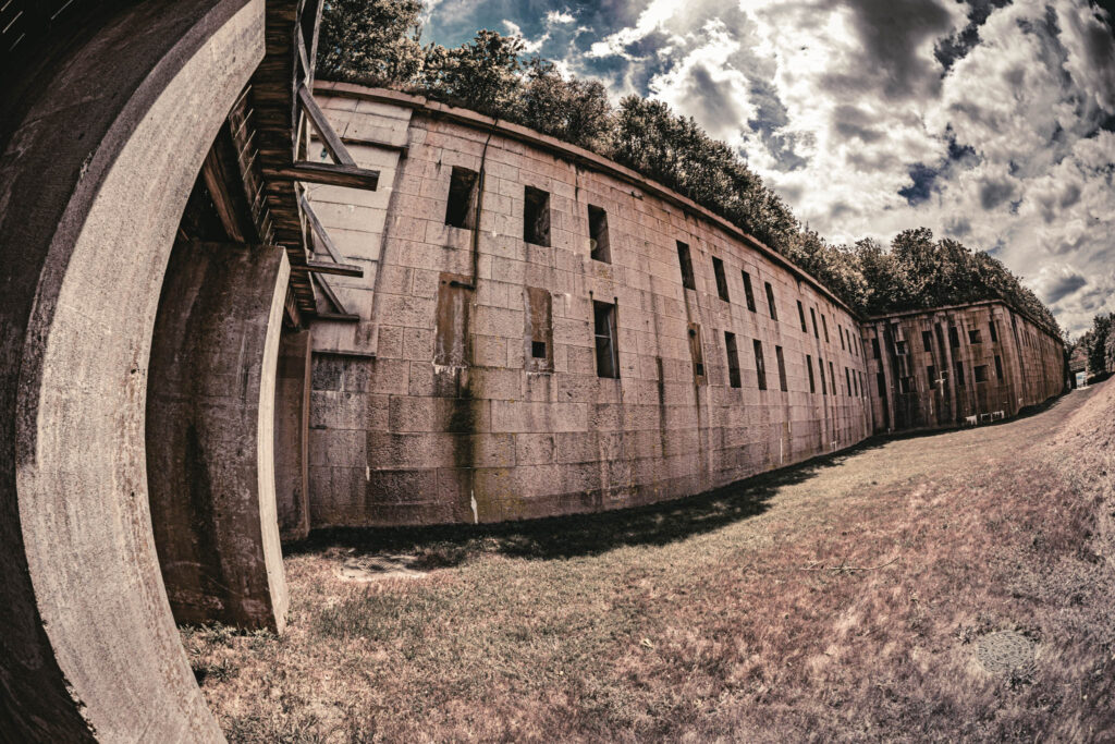 Fort Warren, Georges Island (photo June 19, 2026) view from dry ditch of Front III exterior wall and Bastion D (completed 1861, bridge early 20th C).