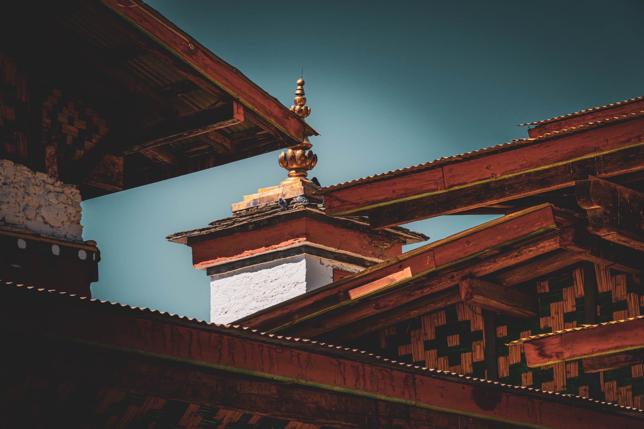 Jambay Lhakhang, Bumthang Valley, Bhutan, orig. 659 AD (photo Oct. 26, 2018) northwest chorten roof from courtyard.