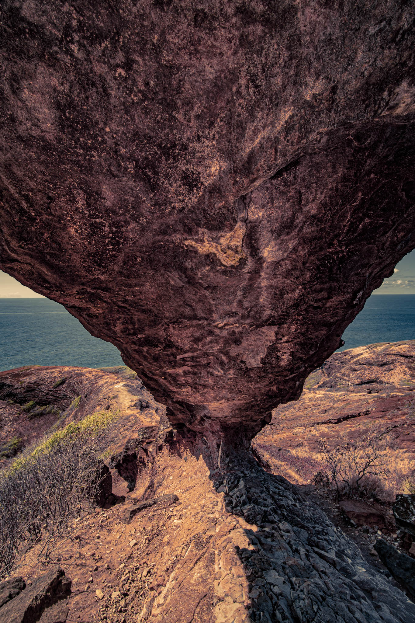 Koko Crater Arch, above Kalanianaʻole Highway, Oahu Island (photo 17 August 2021), view from under arch downhill towards shore.