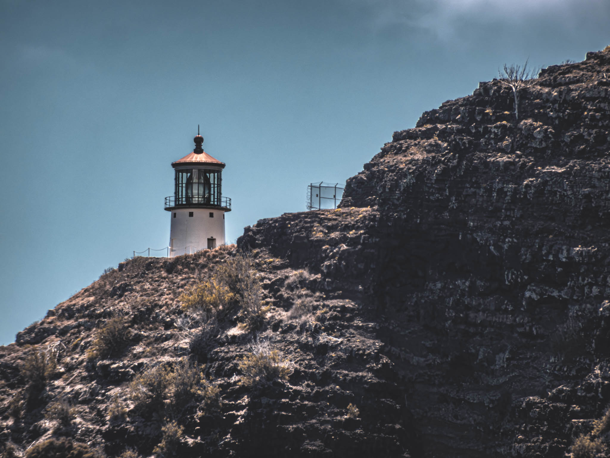 Makapu’u Point headland and lighthouse, Oahu Island (photo 17 August 2021), from from Makapuu Beach Park.