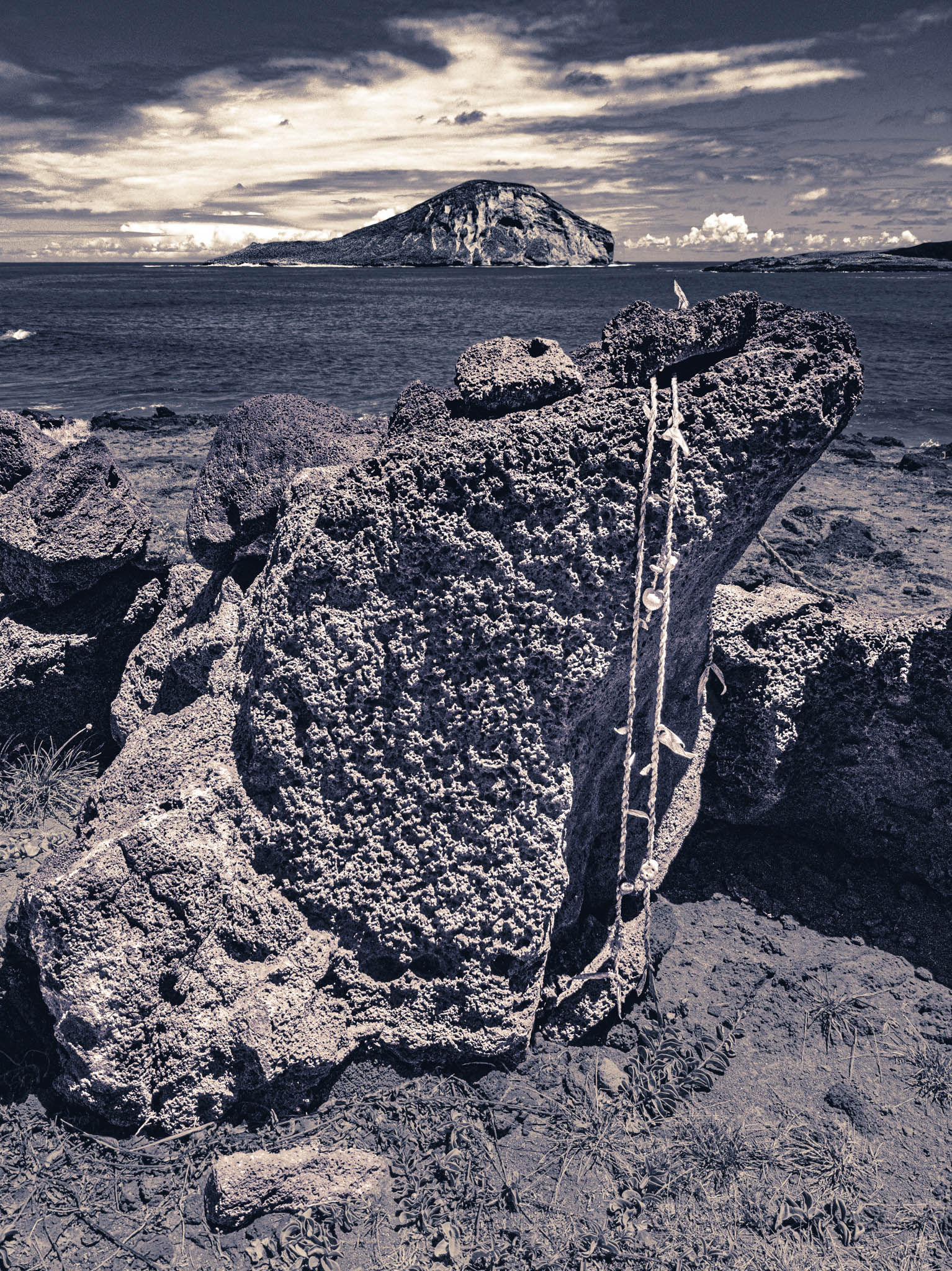 Makapu’u Heiau, Kalanianaʻole Highway, Oahu Island (photo 17 August 2021), with Kāohikaipu Islet (R) and Mānana Island (L) in far background.